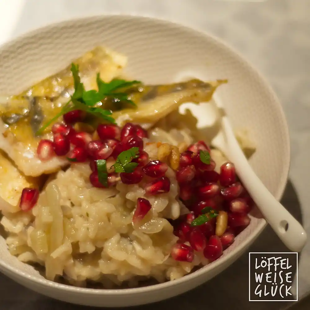 Knuspriger Zander auf Fenchelrisotto mit Granatapfel-Gremolata